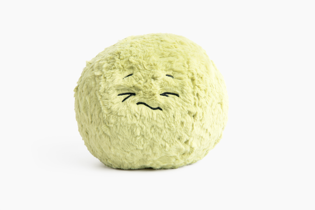 This photo shows the Green Hug Ball on white background, the "Oh No!" expression facing us