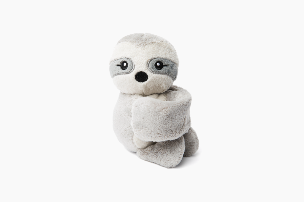 This photo shows a Sloth Hug Baby, bracelet arms curled in, on a white background