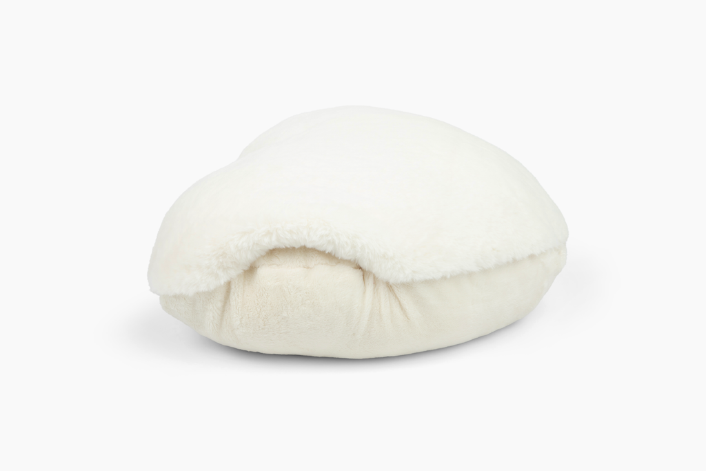 Image shows side view of Ivory Super Sized Heart to Hug Pillow on white, with the opening to it pocket visible